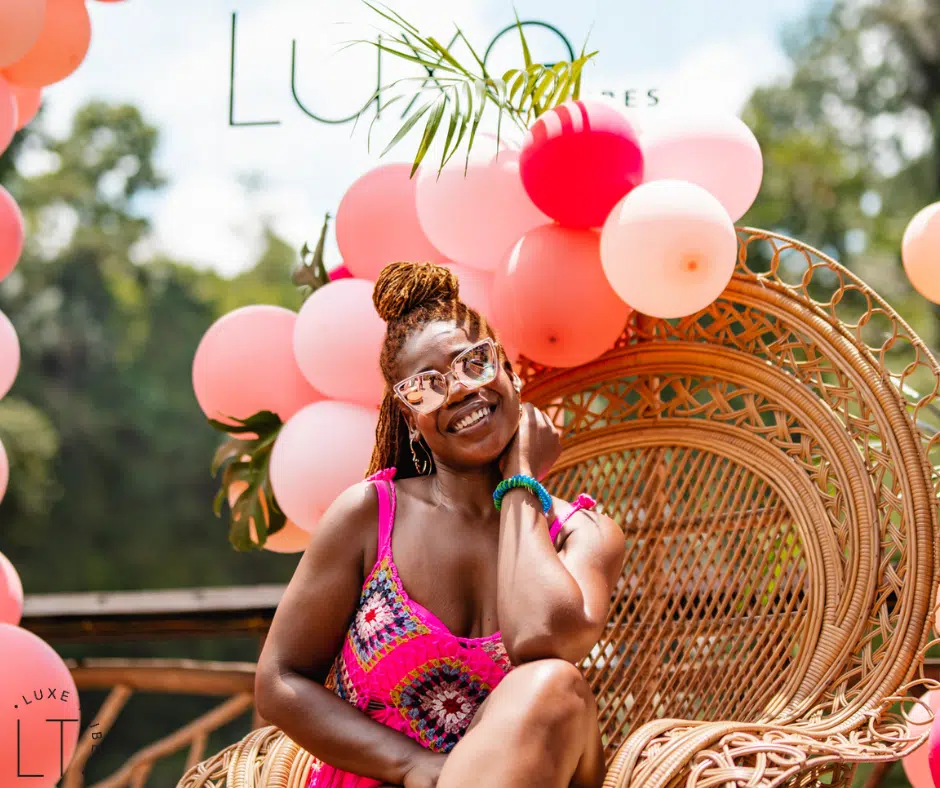 Lady sitting down at a Luxe Tribes welcome event
