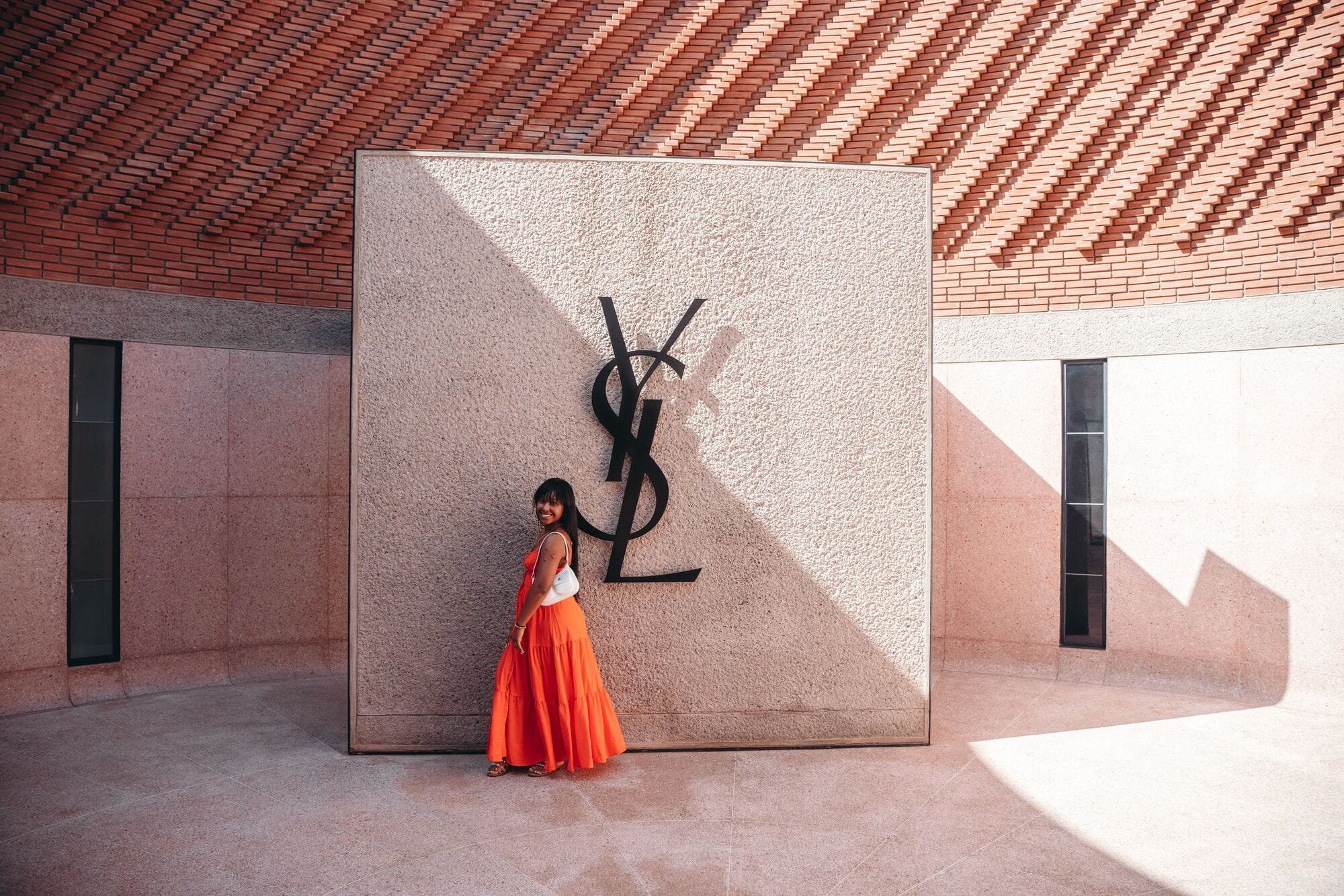 Traveler at the YSL wall in Marrakech